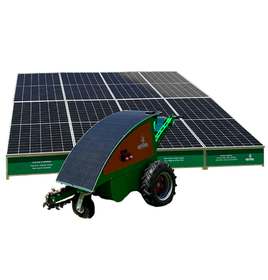 The Aftrak tractor parked against solar panels